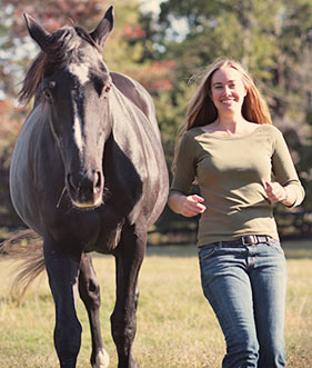 Emily and horse running